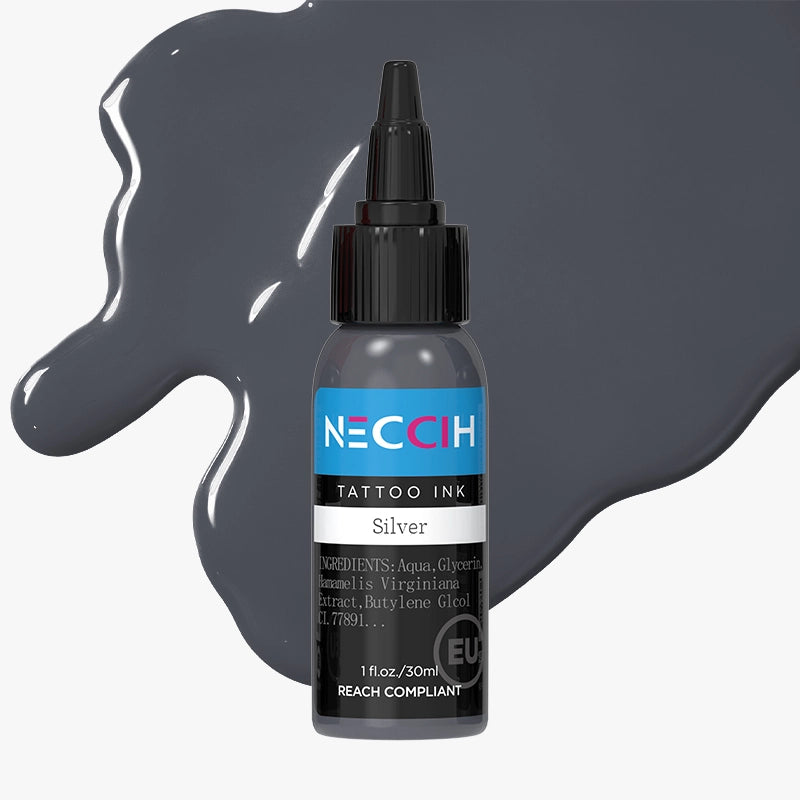 NECOH Silver Tattoo Ink bottle with a black cap and label, shown on a light gray background with gray ink splashes behind it.