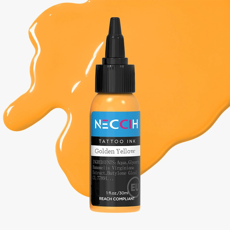 A bottle of NECCIH Tattoo Ink in the shade Golden Yellow, set against a light gray background with a glossy, dripping orange-yellow paint splash behind it.