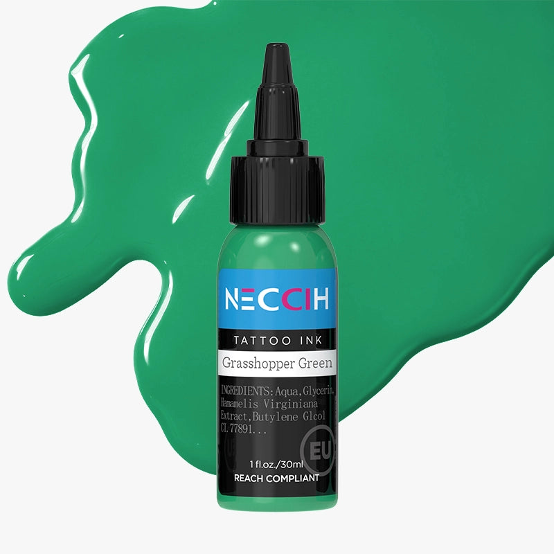 A bottle of NECCH Tattoo Ink in Grasshopper Green, set against a large green paint splash on a light gray background.